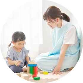 The babysitter playing with the child